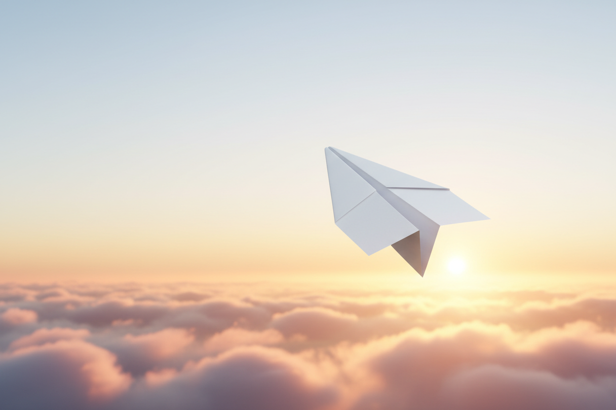Paper airplane gliding over clouds toward the sun
